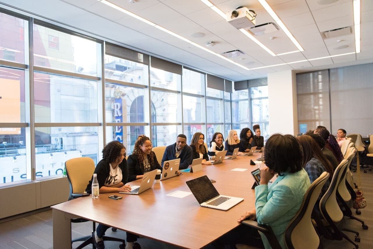 Diverse team collaborating in a modern conference room